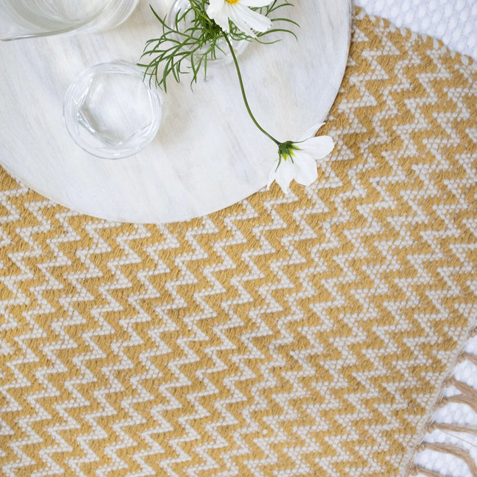 aged gold cotton rug