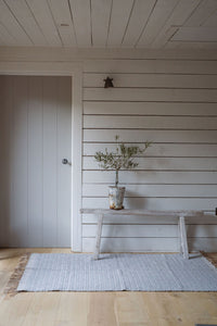 Zig zag area rug in navy blue